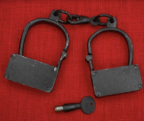 Boxed iron manacles - boxed, metal